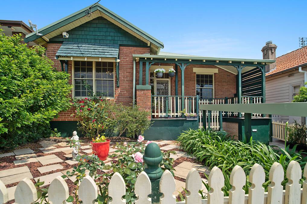 This home at 14 Bridge Street in Waratah for $720,000, well above its guide of $600,000 to $660,000.