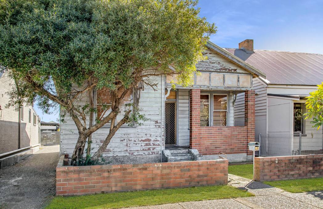 LOCAL INTEREST: This run-down house in Ravenshaw Street, The Junction on a block around 500 square metres sold under the hammer.