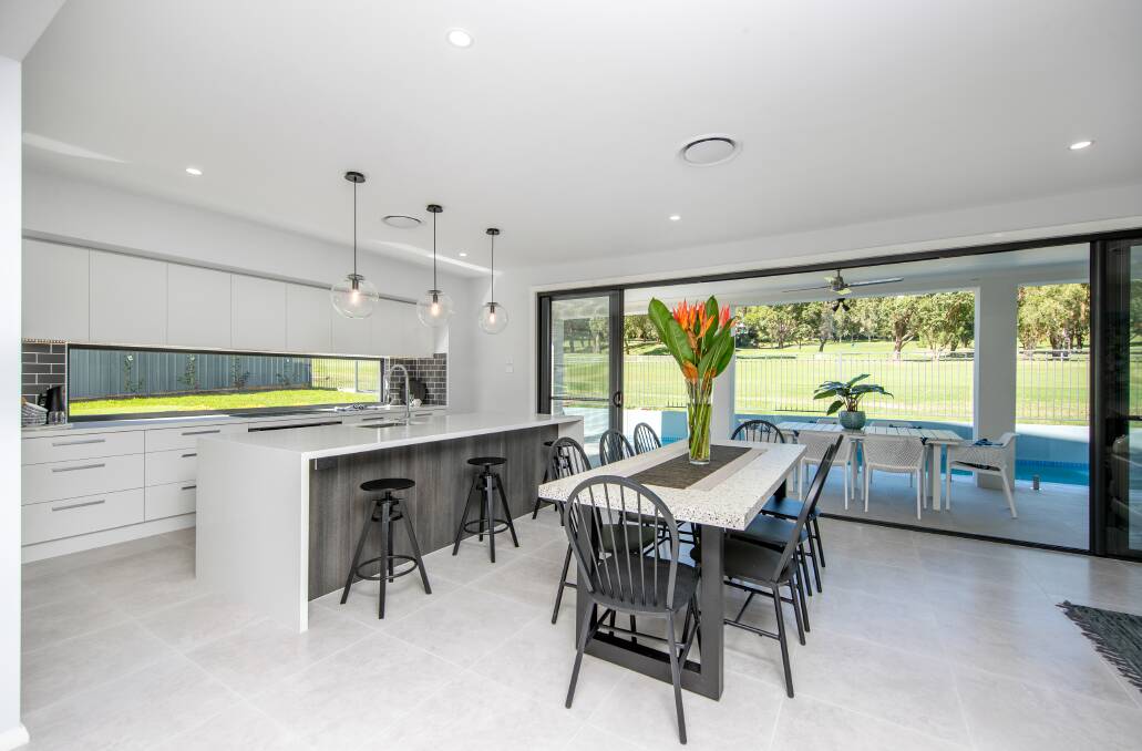 An ultra-contemporary residence backing on to Merewether Golf Course in Adamstown's Ella Street has been bought for $1.6 million. 