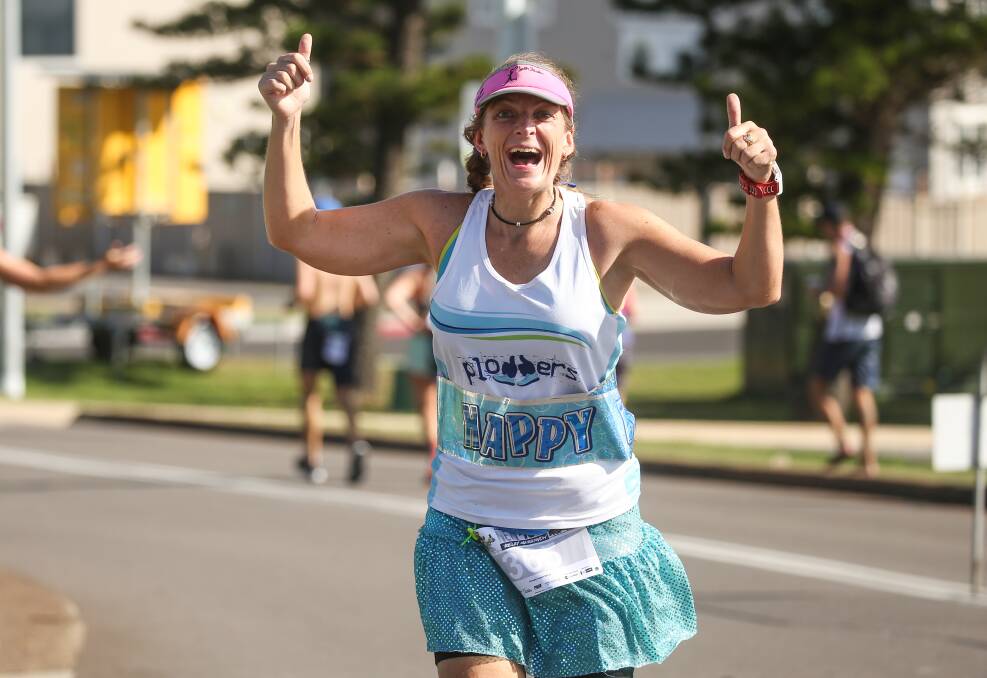 HAVING FUN: There were plenty of smiles amongst the grimaces on course during NewRun held around Newcastle foreshore on Sunday.