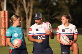 Hunter Wildfires new women's coach Anthony Eriksson with players Emily Marsh, left, and Renee Clarke, right, at training. Picture by Peter Lorimer