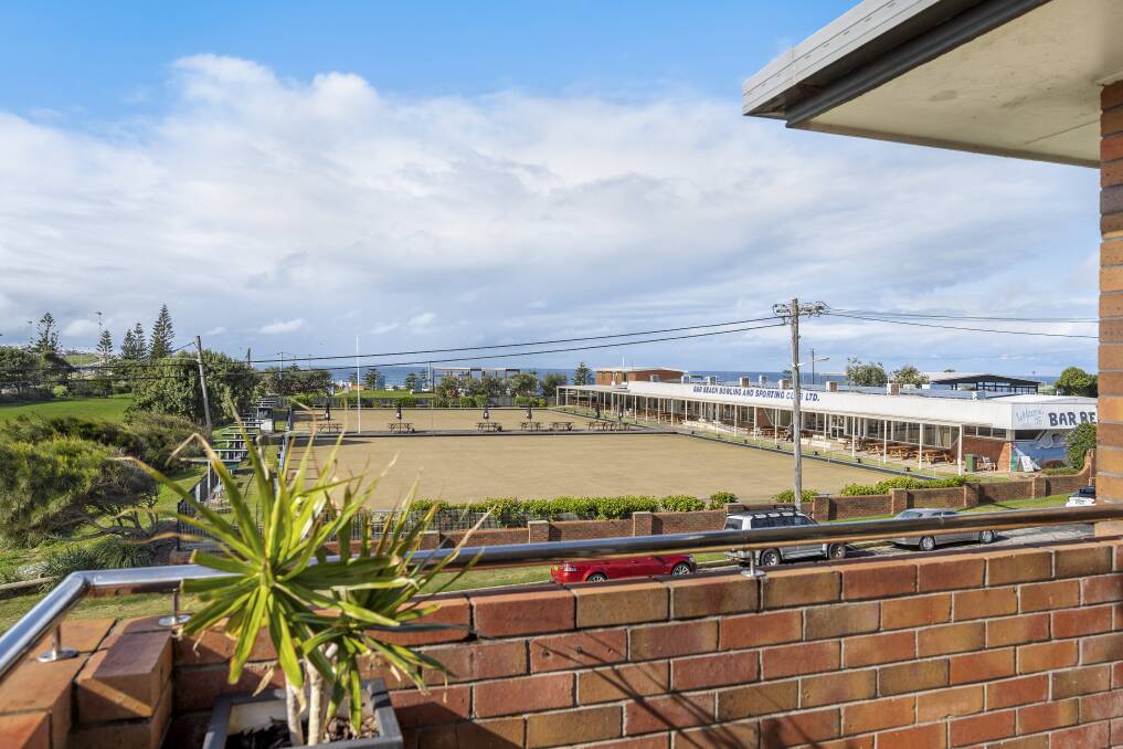 COASTAL OUTLOOK: This top-level apartment overlooking Bar Beach Bowling Club and the ocean has three bedrooms and is within footsteps of the beach.