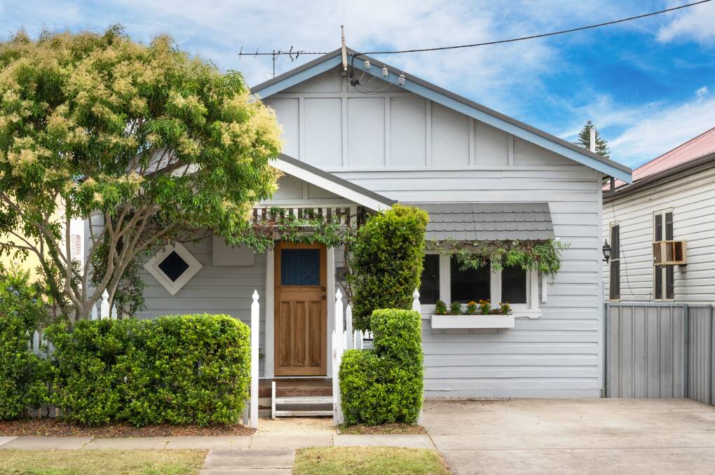 This renovated three-bedroom cottage at 97 Macquarie Street, Mayfield has a guide of $550,000 to $600,000.