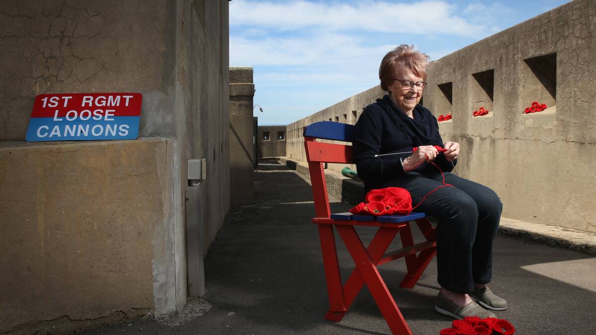 HARD AT WORK: Barbara O'Brien, one of the volunteers at Fort Scratchley, knitting poppies.  