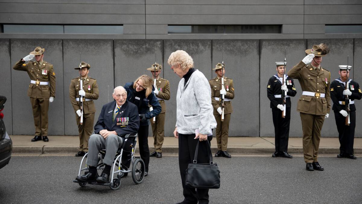 OCCASION: Lance Cooke and daughter, Rosalee, arrived at the Australian War Memorial service on Saturday to a guard of honour. Photo: Department of Veterans Affairs.