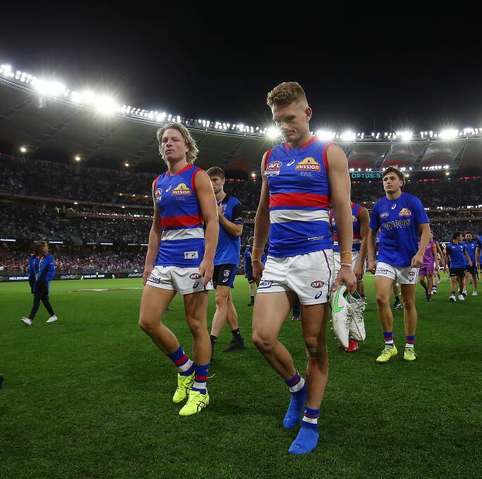 The Dogs' defence was overrun by the Dees. Photo: Gary Day/AFL Photos via Getty