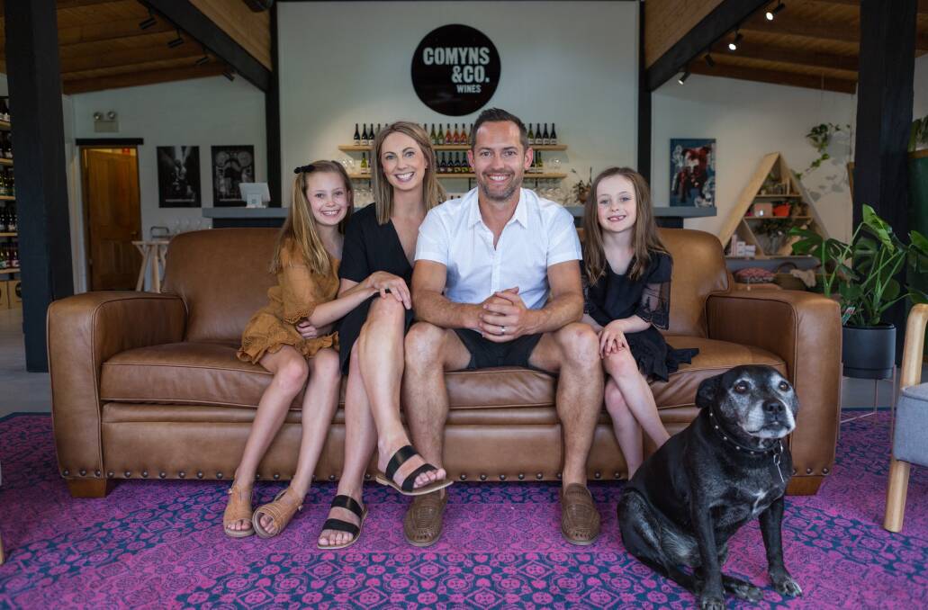 FAMILY AFFAIR: Scott Comyns with his wife Missy and daughters Polly (left) and Topsy in their Peppers Creek Centre cellar door at Pokolbin. Picture: MJK Creative