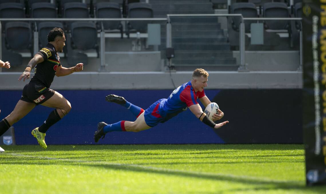 Newcastle under-21s captain Thomas Cant crosses for a try in the Jersey Flegg Cup grand final at CommBank Stadium on Sunday. Picture by NSWRL 