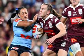 Newcastle duo Yasmin Clydsdale, left, and Tamika Upton, right, at Suncorp Stadium on Thursday night. Picture Getty Images