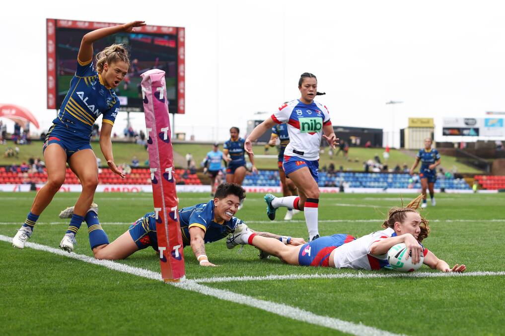 Knights fullback Tamika Upton scores her side's first try. Picture by Getty Images