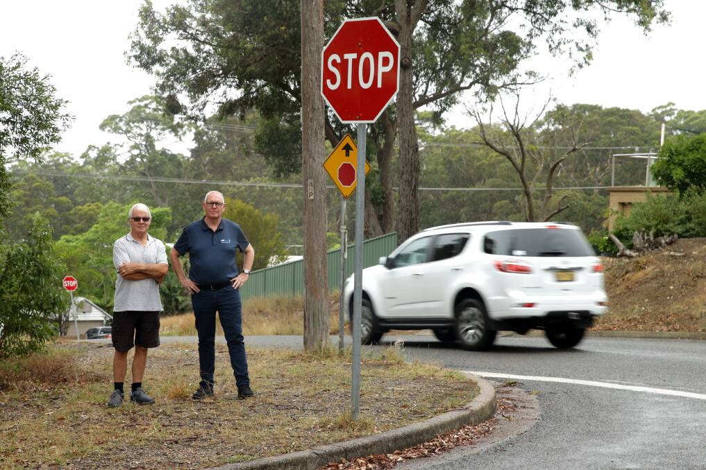CONCERNS: Nords Wharf Progress Association president Ray Flett, right, and resident Warwick Luxon on Government Road. Picture: Jonathan Carroll