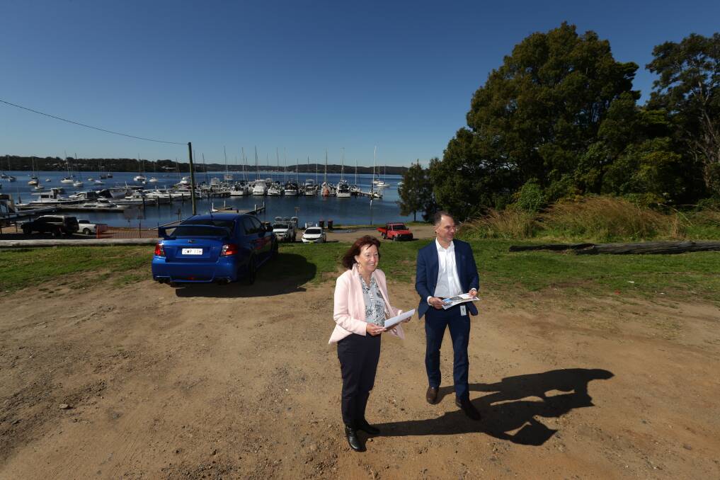 PLANS: Lake Macquarie mayor Kay Fraser and property manager David Antcliff on the block of foreshore land at Toronto on Thursday. Picture: Jonathan Carroll