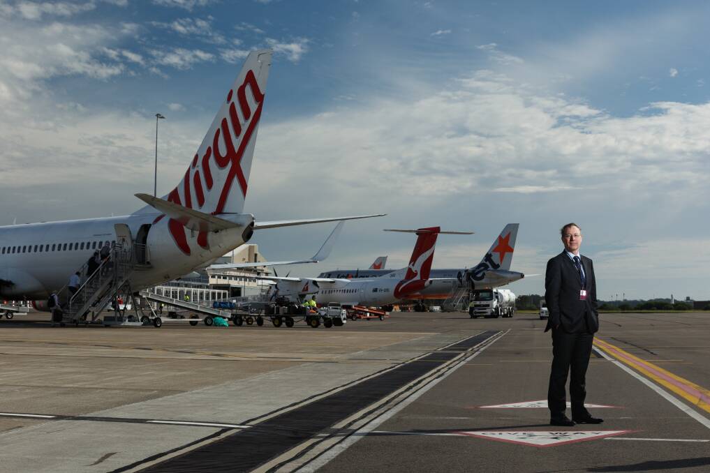 FLIGHTS SLASHED: Dr Peter Cock is confident Newcastle Airport will not have to lay off staff as result of the flight cuts. Picture: Max Mason-Hubers