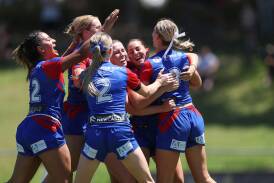 Newcastle's Tarsha Gale Cup players celebrate a try. Picture NSWRL
