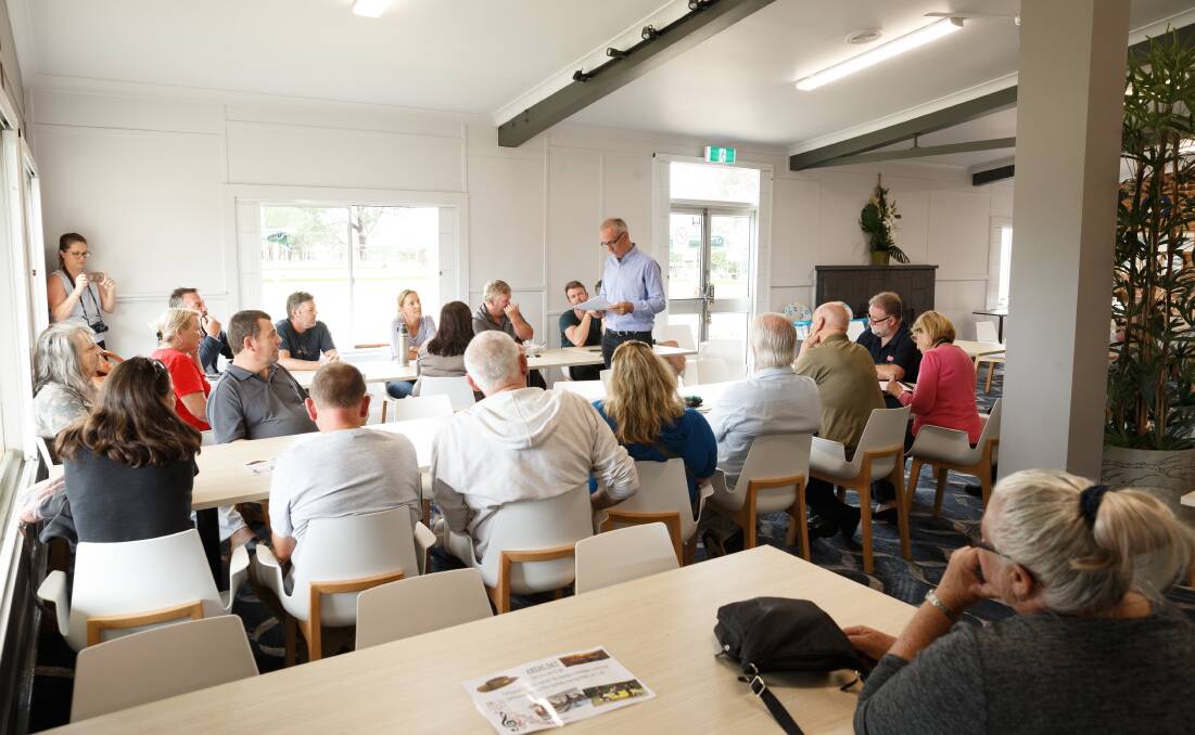 TALKS: Greg Piper MP speaks to Myuna Bay Sport and Recreation Centre staff at Club Catalina in Rathmines on Tuesday. Picture: Max Mason-Hubers 