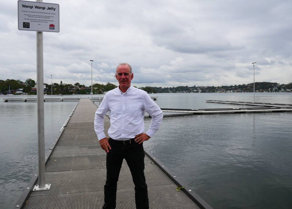 OPEN: Lake Macquarie MP Greg Piper unveils the new $1.38 million Wangi Wangi jetty on Thursday. 
