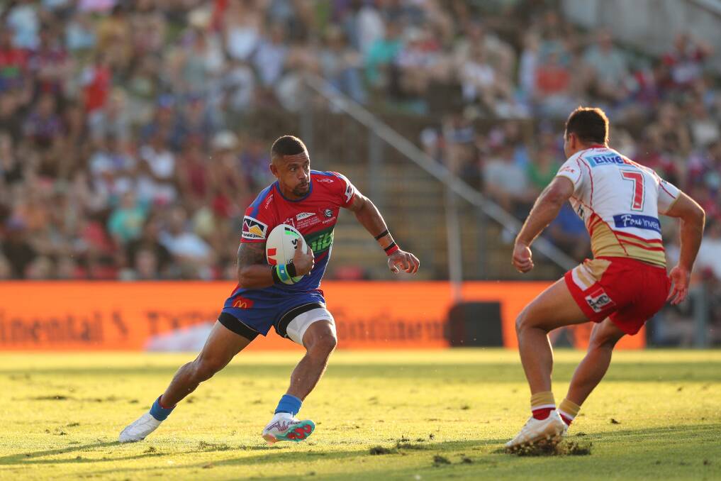 Dane Gagai takes a run against the Dolphins. Picture by Max Mason-Hubers