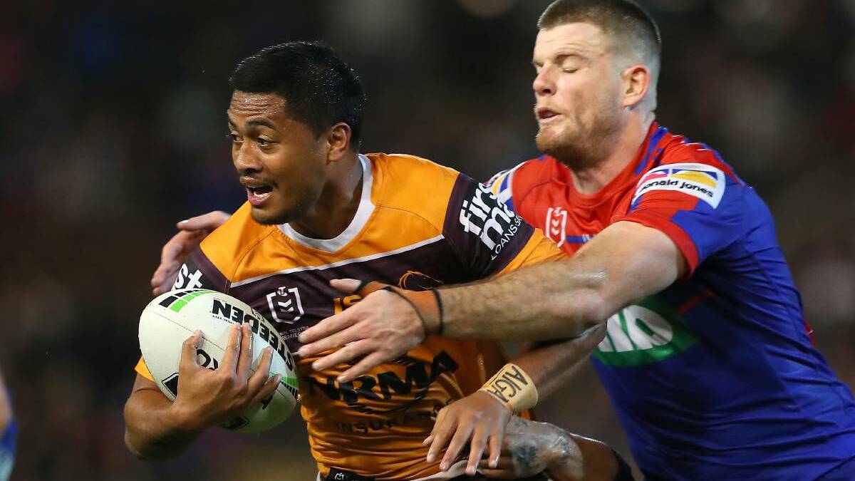 UP IN THE AIR: Anthony Milford playing for the Broncos against the Knights. Picture: Getty 