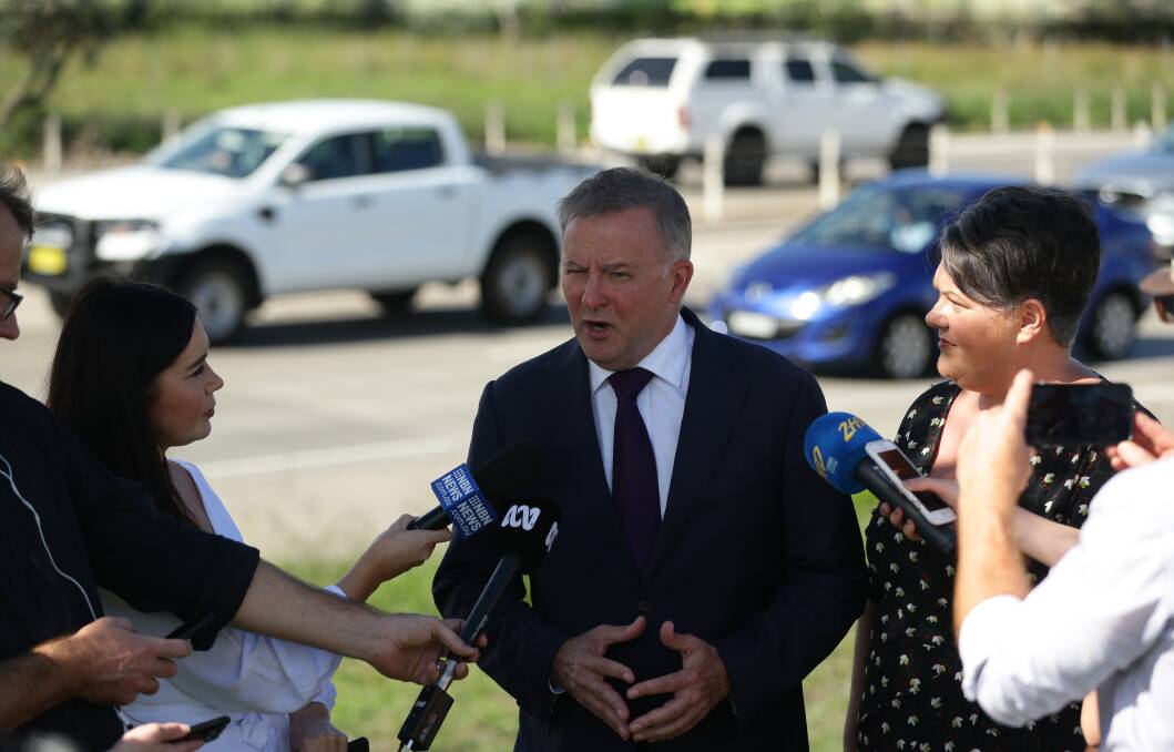 BACKED: Labor's infrastructure spokesman Anthony Albanese with Paterson MP Meryl Swanson at Beresfield on Tuesday announcing the party's pledge of $1.6 billion for the M1 extension. Picture: Jonathan Carroll