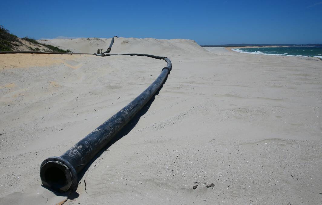TRANSFER: A sand pipeline on Blacksmiths beach in 2014. 