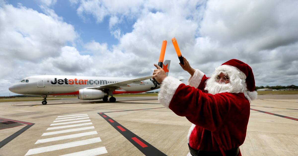 HAPPIER TIMES: A Jetstar plane arrives at Newcastle Airport. Picture: Marina Neil