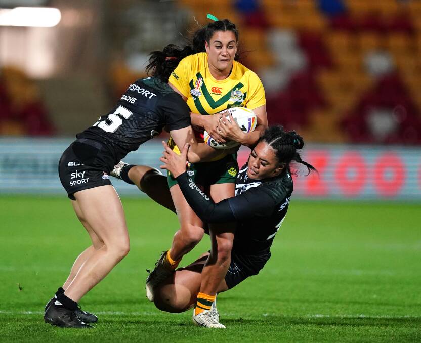 Australian back-rower Yasmin Clydsdale takes a run against New Zealand last week. Picture Getty Images 