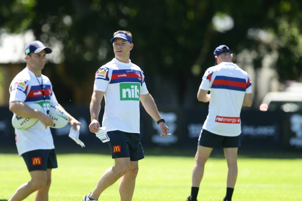 DEPARTING: Knights assitant Willie Peters, left, with head coach Adam O'Brien, centre. 