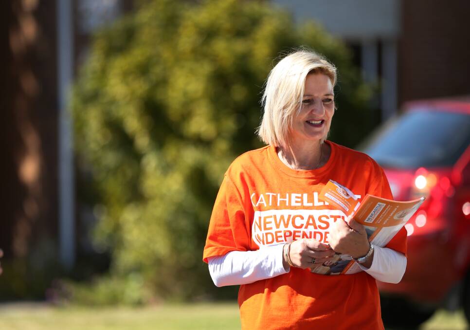 CAMPAIGNING: Cr Kath Elliott handing out electoral material during the 2017 election. 