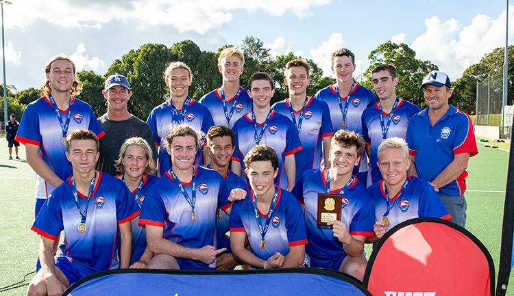 THREE STRAIGHT: Newcastle Hockey's under-18 division one side after winning the State Championship. 