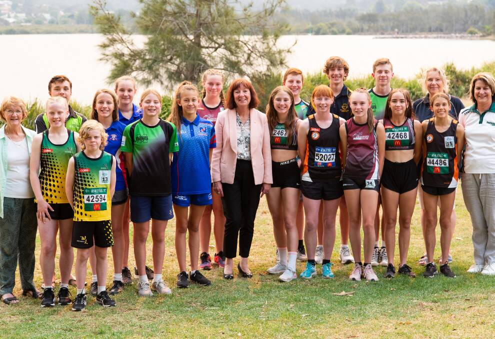 LOCKED IN: Lake Macquarie mayor Kay Fraser with the selected athletes who will compete at the International Children's Games in Hungary next year. Team Lake Mac features swimmers and track and field athletes. 