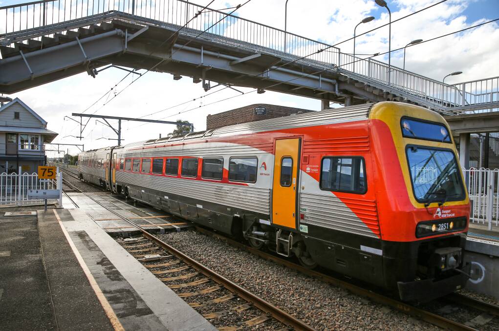 ON TIME: A Hunter line train at Hamilton station. Additional services will begin running on the line next year. Picture: Marina Neil