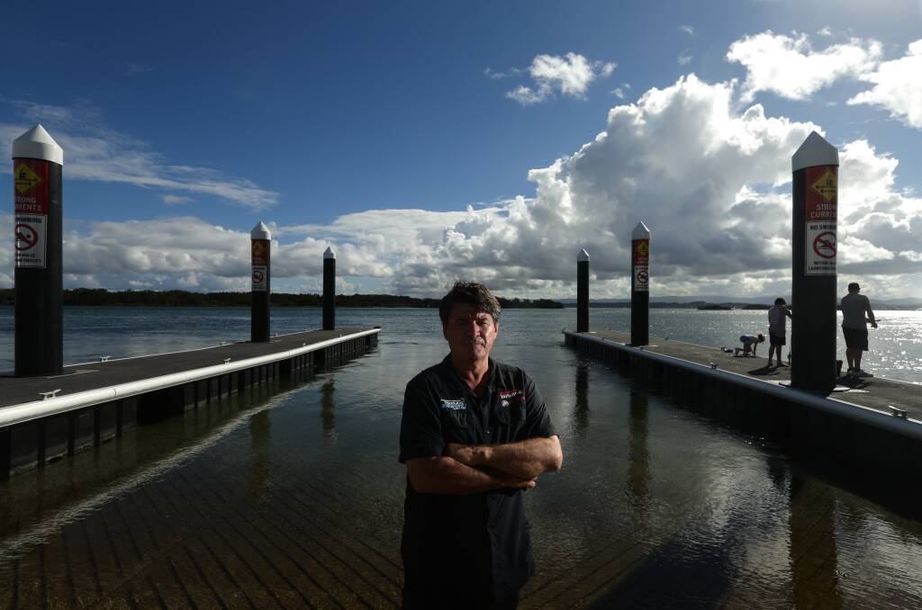DISMAYED: Veteran Lake Macquarie boater Jason Nunn at Pelican boat ramp on Tuesday. He says there are a range of issues with the ramp, which opened about a month ago. Pictures: Jonathan Carroll