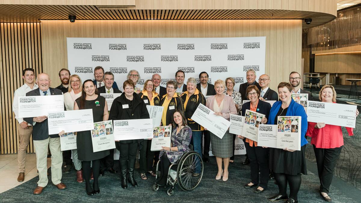 STOKED: All 15 grant recipients at NEX in Newcastle on Thursday. 