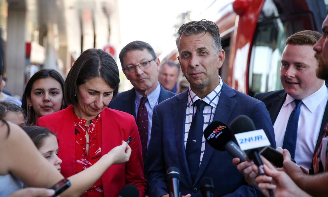 ALL DONE: Mr Constance with Premier Gladys Berejiklian at the Newcastle light rail opening. Picture: Marina Neil