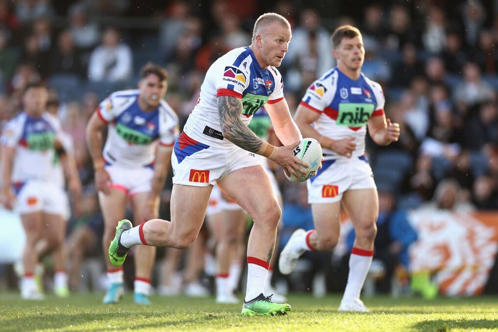 EFFORT: Knights lock Mitch Barnett takes a run during Newcastle's 14-10 win over Wests Tigers on Sunday. Picture: Getty Images