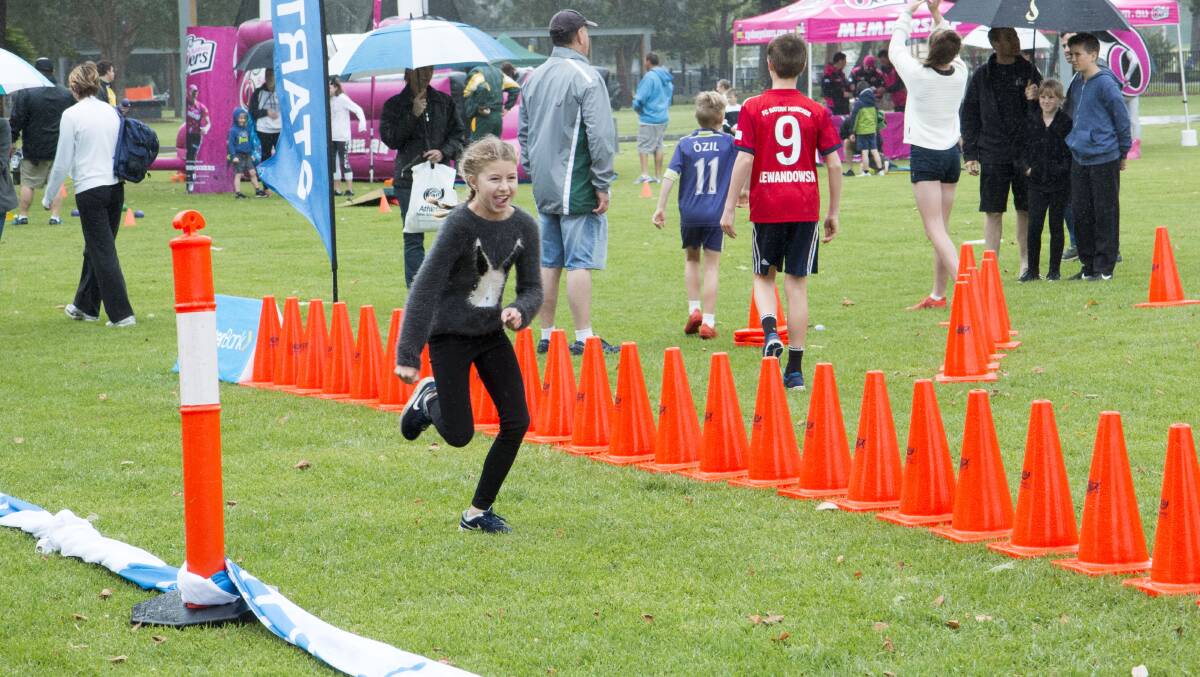 GIVING IT A GO: A child at last year's SportsFest event. 