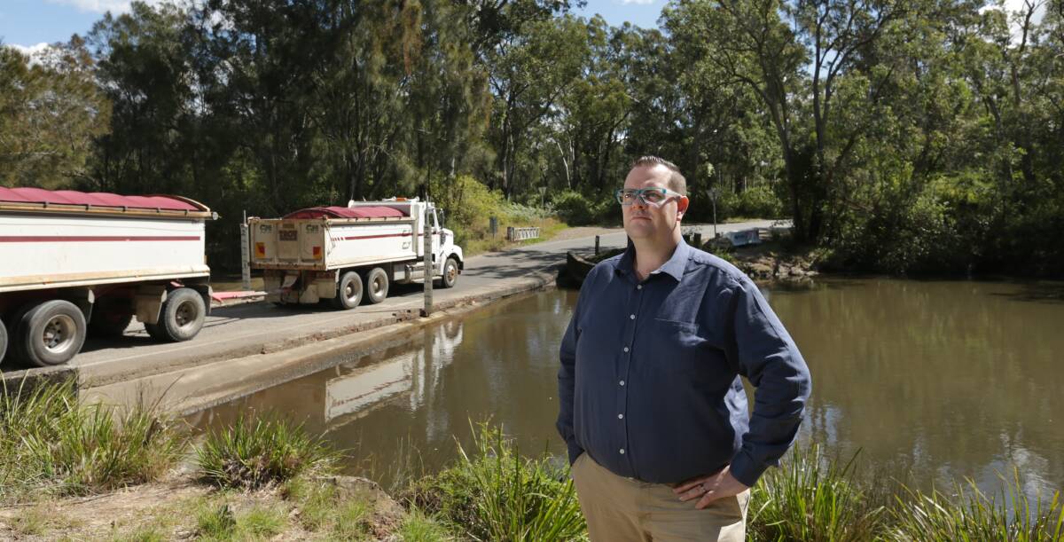 BUILD THE BRIDGE: Lake Macquarie councillor Kevin Baker wants to fast-track his proposal to build a bridge over Cockle Creek to replace Barnsley Weir. Picture: Simone De Peak