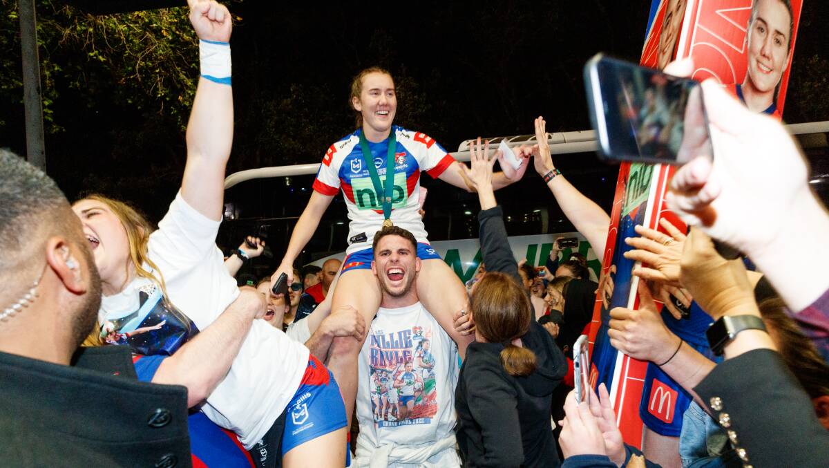 Tamika Upton, centre, celebrates after winning the NRLW grand final last year. Picture by Max Mason-Hubers 