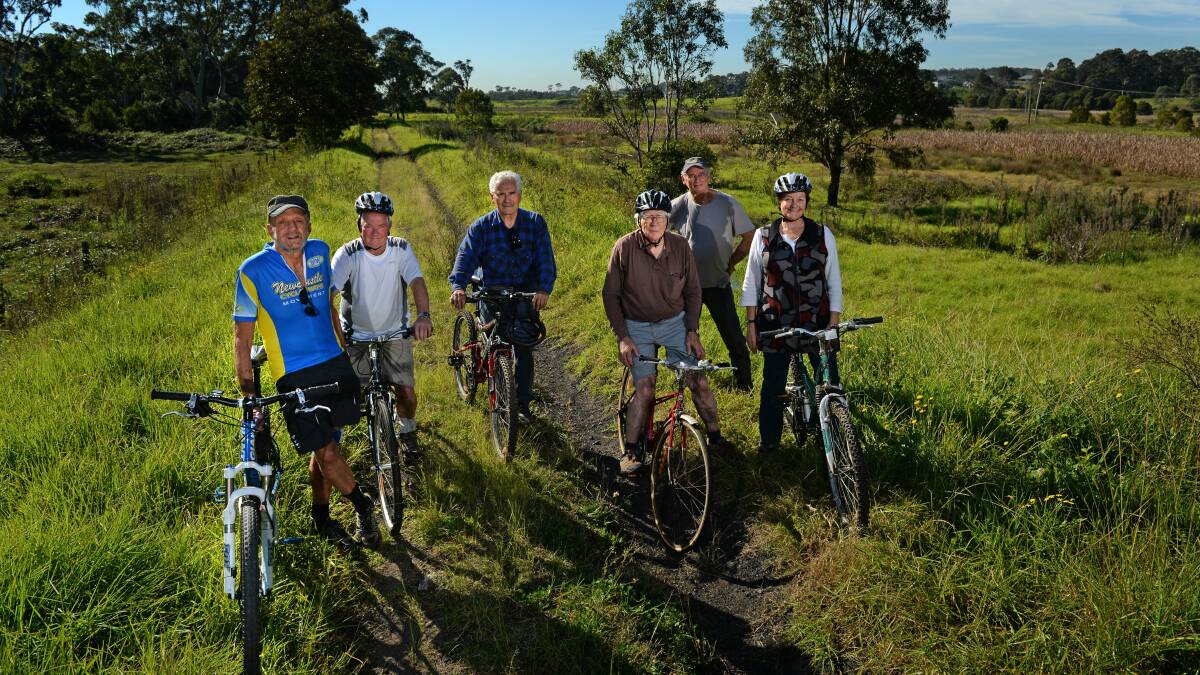 VISION: Cyclists at the Minmi end of the old Richmond Vale railway line in 2013. Picture: Marina Neil 