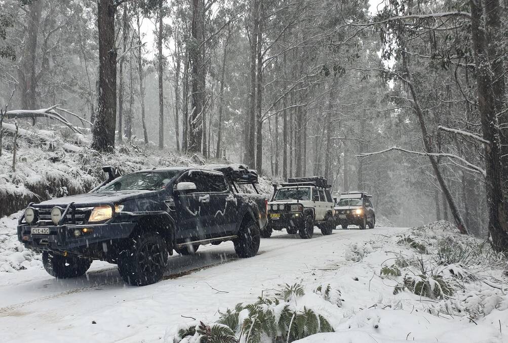 SNOW: A four-wheel drive at Barrington Tops on Tuesday. Picture: Jack Maunder