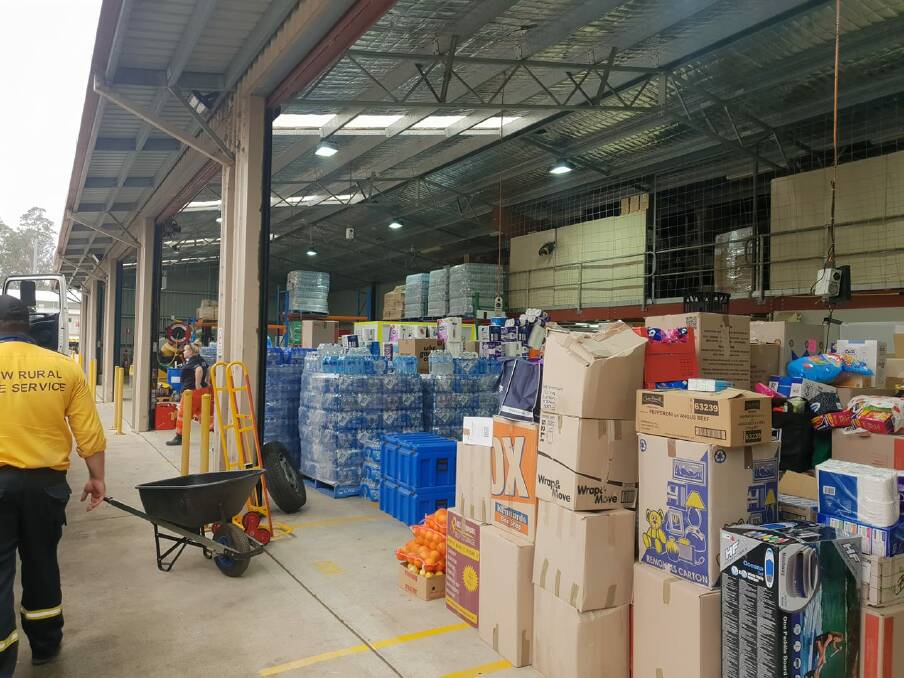 INUNDATED: The huge collection of donations at the Shoalhaven Emergency Management Centre. Picture: James Ferguson