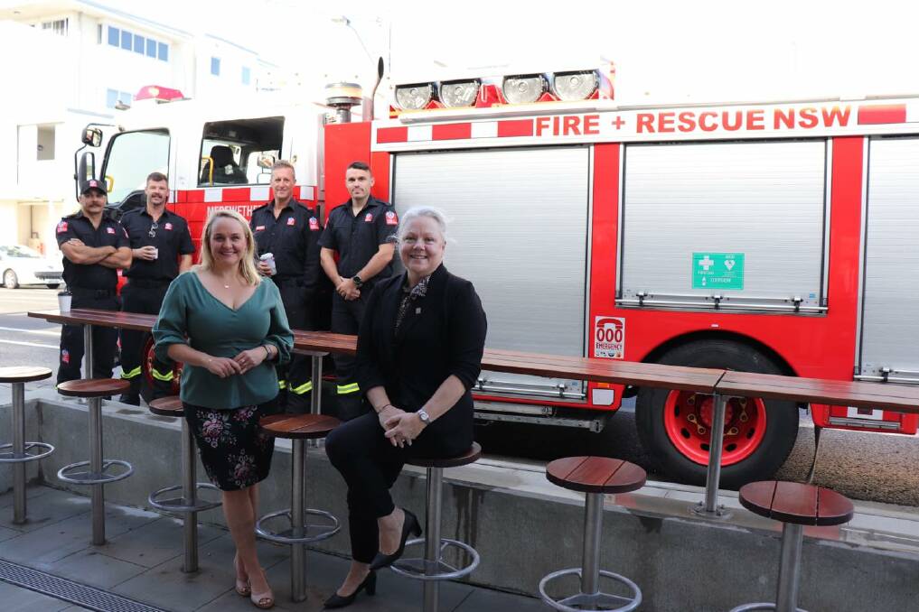 UPGRADE: Newcastle lord mayor Nuatali Nelmes and councillor Carol Duncan with Fire and Rescue NSW firefighters from the nearby Merewether station.
