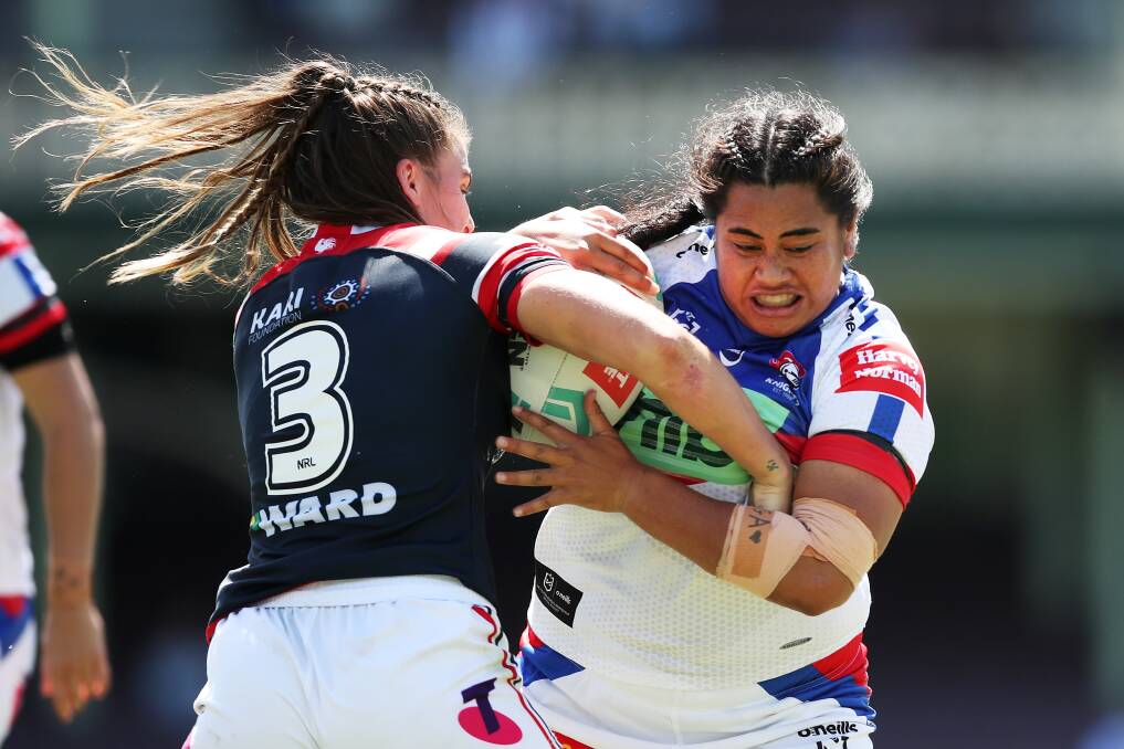 HARD YARDS: Knights prop Maitua Feterika takes a hit up against the Roosters. Picture: Getty Images 