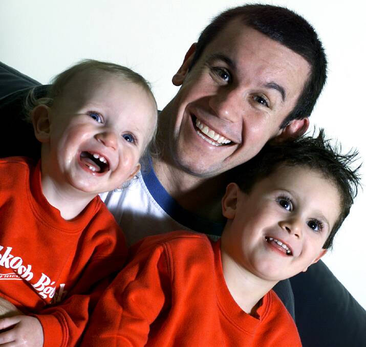 Matthew Johns, with sons Cooper, left, and Jack, right. 