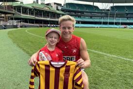Sydney Swans star Isaac Heeney with Cameron Park boy Jordan Bradshaw at the SCG this week. Picture supplied