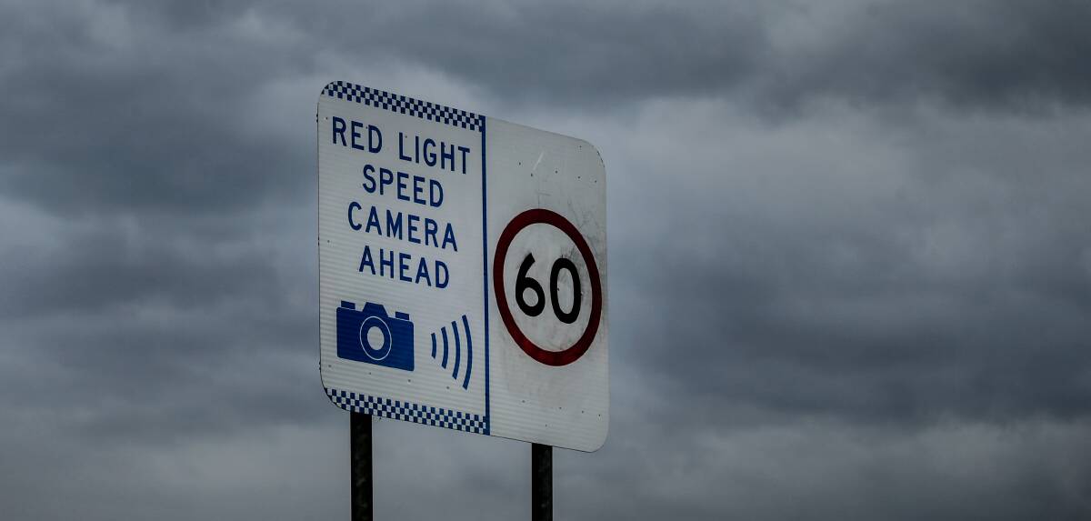 WARNING: A sign on Griffiths Road indicating the red-light speed camera, which captures offences in both the east and west directions. 