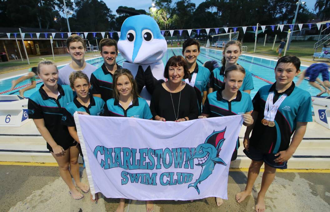 STOKED: the Charlestown Swim Club squad with Lake Macquarie mayor Kay Fraser.