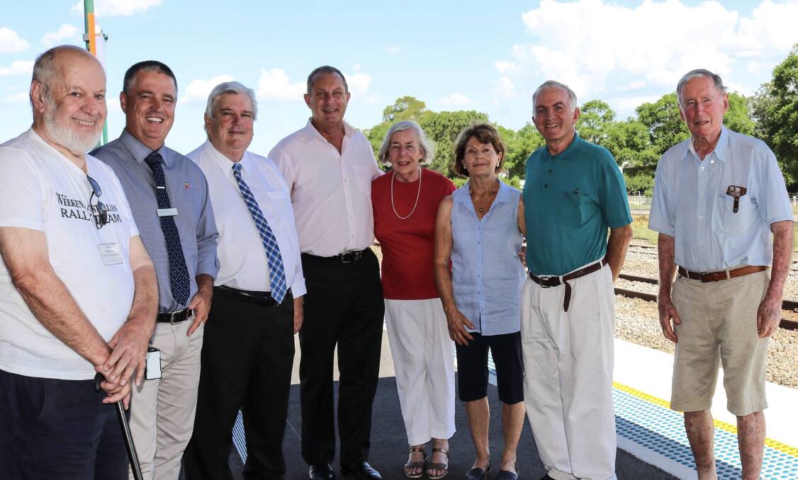 HAPPY DAYS: Upper Hunter MP Michael Johnsen with officials in Singleton on Wednesday.