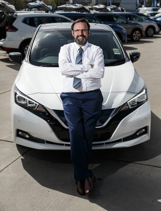 READY TO SELL: Eddie Tomlin at Cardiff Nissan. Picture: Max Mason-Hubers