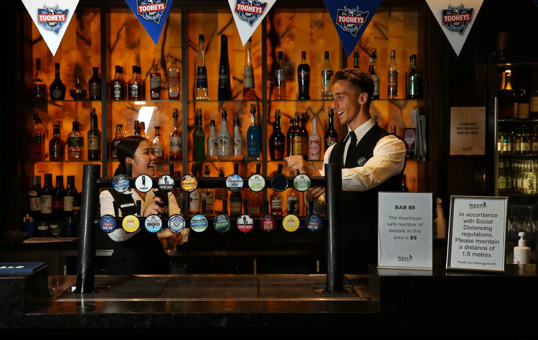 BACK: Bartenders Praew Gatt and David Mitrevski at Wests New Lambton. Picture: Simone De Peak 